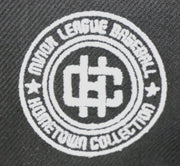 Load image into Gallery viewer, COLORADO SPRINGS MILLIONAIRES (BLACK) NEW ERA 59FIFTY FITTED (GLOW IN THE DARK LOGO)