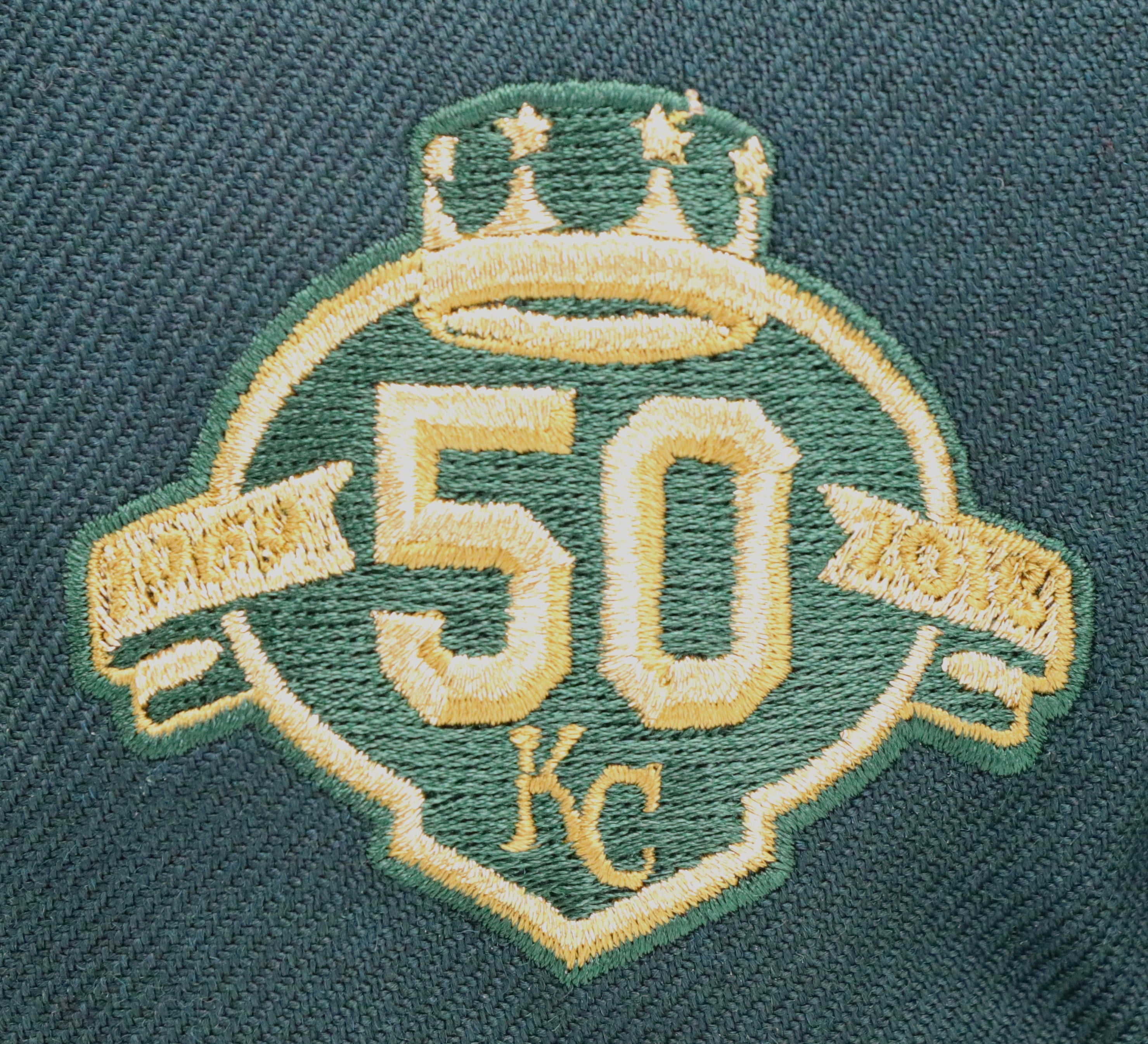 KANSAS CITY ROYALS (DARK GREEN) "50TH ANN" NEW ERA 59FIFTY FITTED (RED UNDER VISOR)